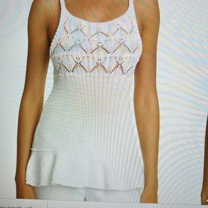 Rebecca Taylor Peplum Stitch tank. Airy open knitting designed in a longline fit